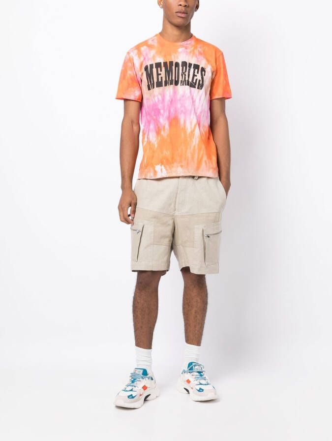 Stain Shade x Hiroshi T-shirt met tie-dye print Oranje