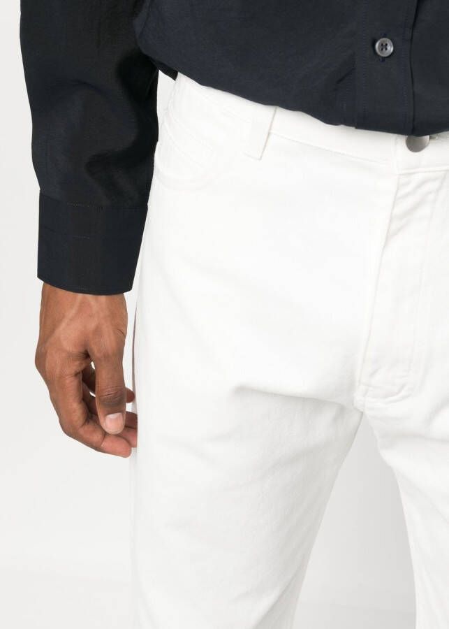 Studio Nicholson Jeans met toelopende pijpen Wit