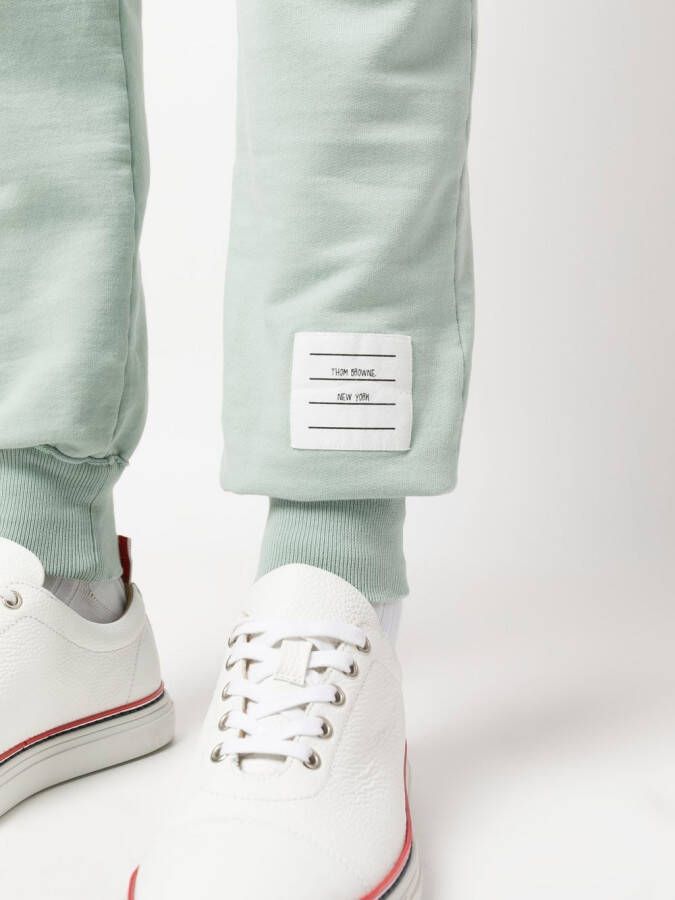 Thom Browne Joggingbroek met vier strepen Groen