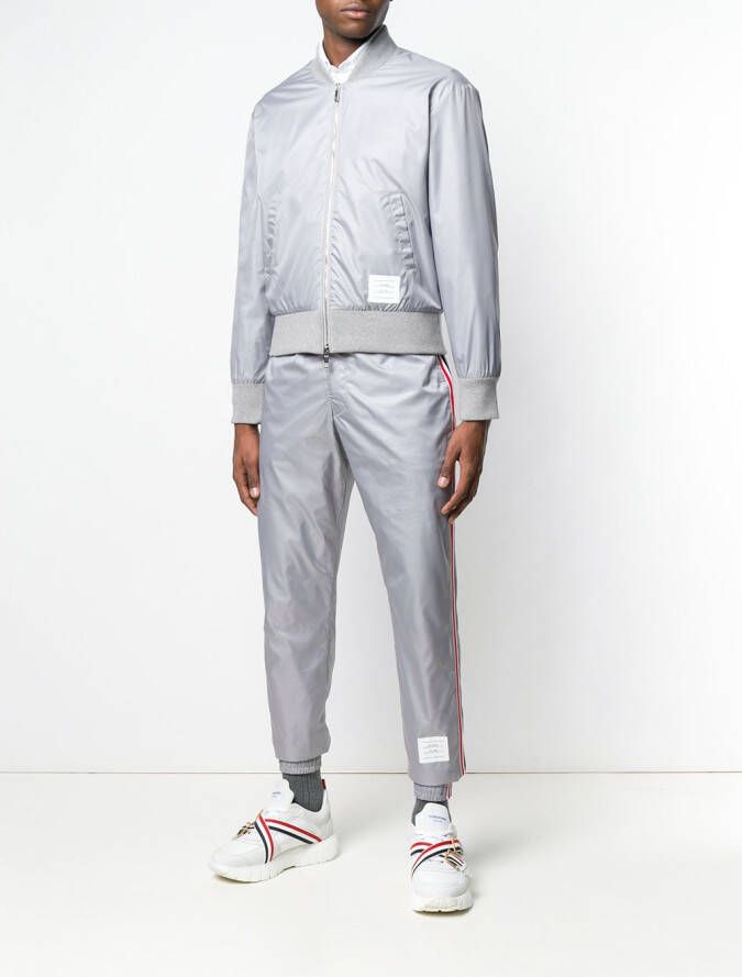 Thom Browne Trainingsbroek met strepen Grijs