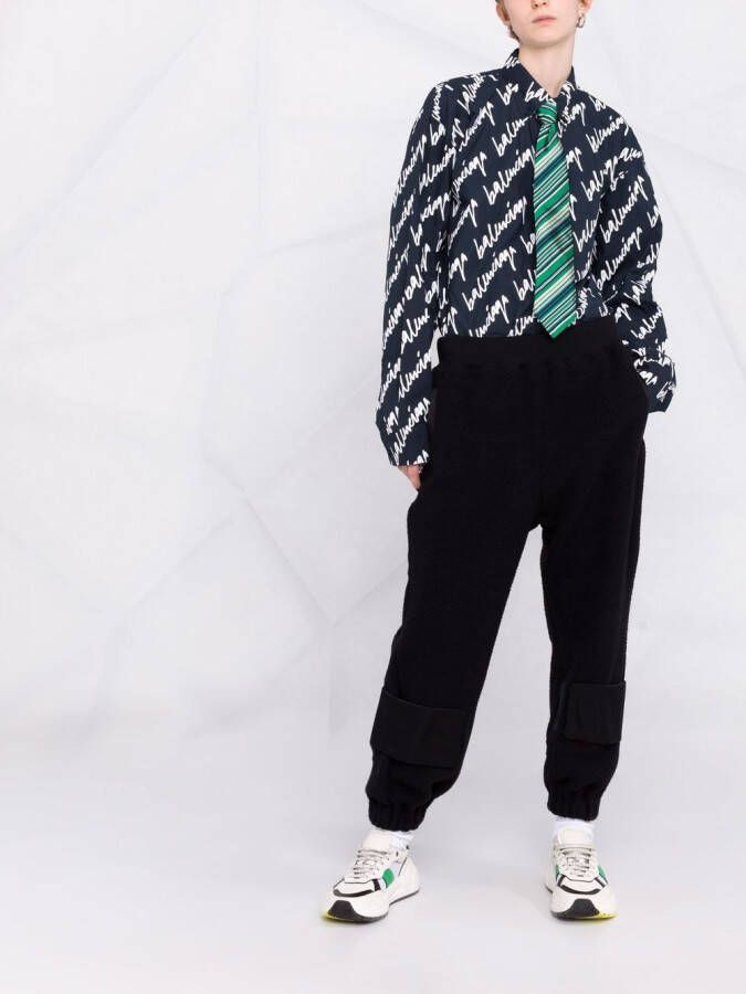 Undercover x Evangelion trainingsbroek met toelopende pijpen Zwart