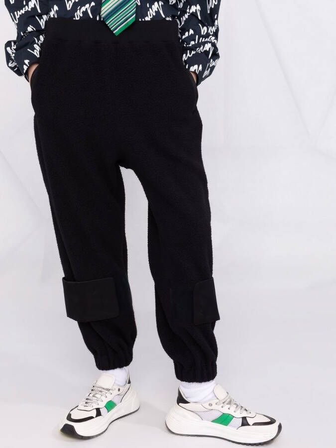 Undercover x Evangelion trainingsbroek met toelopende pijpen Zwart