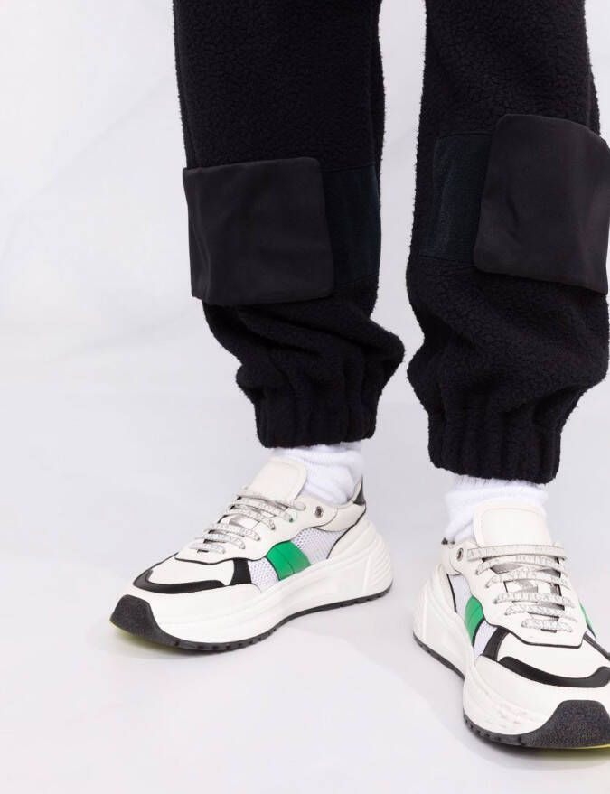 Undercover x Evangelion trainingsbroek met toelopende pijpen Zwart