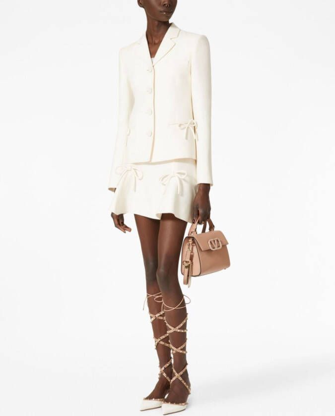 Valentino Garavani VSLING kleine schoudertas Beige