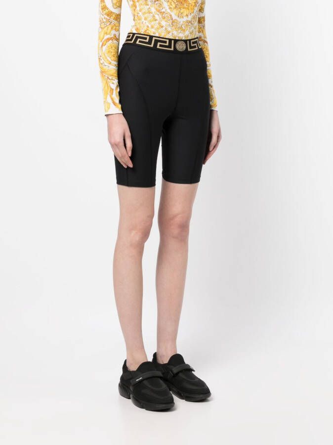 Versace Shorts met logoband Zwart