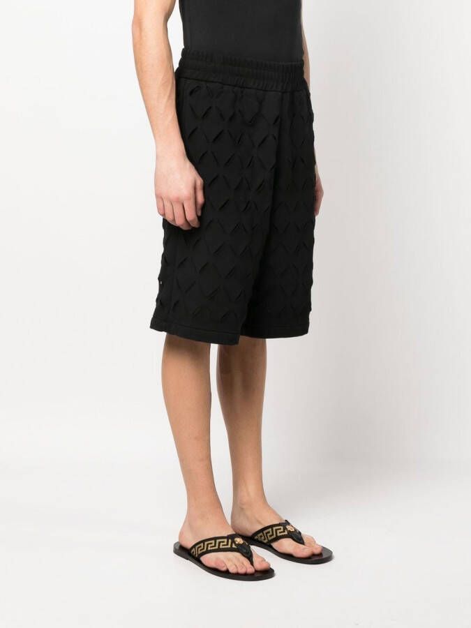 Versace Shorts met logoprint Zwart