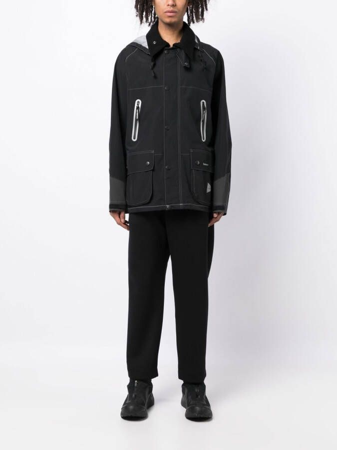 White Mountaineering Trainingsbroek met zakken Zwart