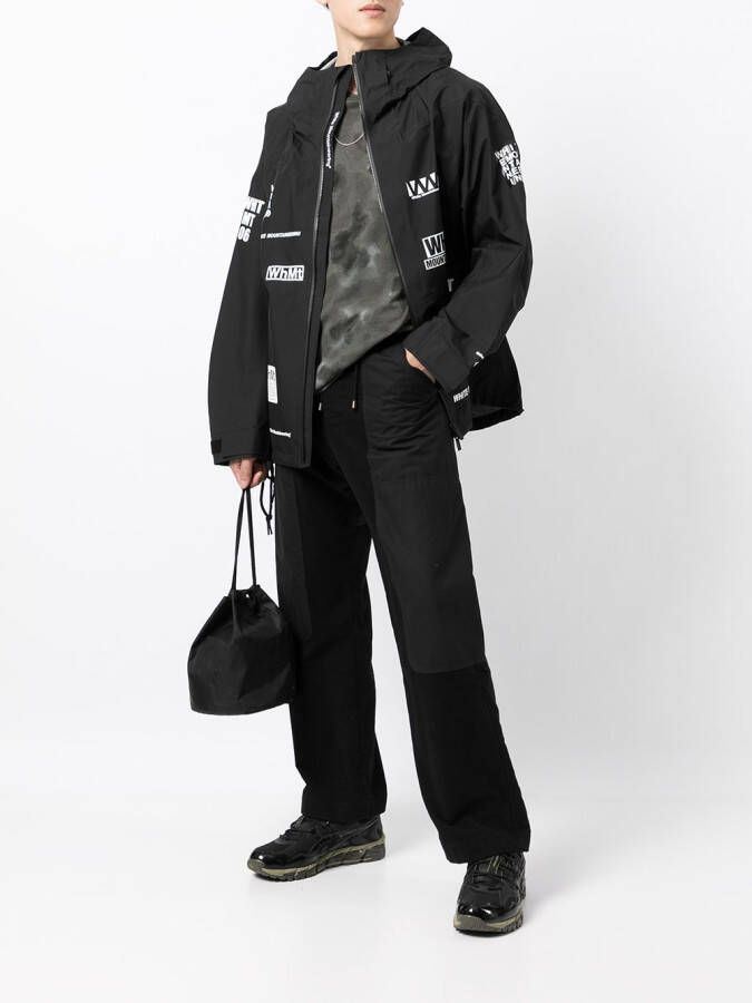 White Mountaineering Jack met print Zwart