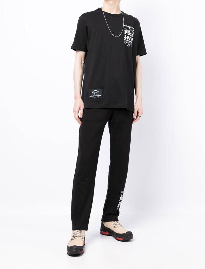 White Mountaineering Joggingbroek met logoprint Zwart