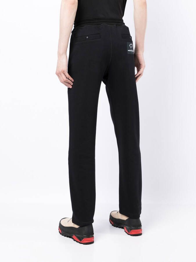White Mountaineering Joggingbroek met logoprint Zwart
