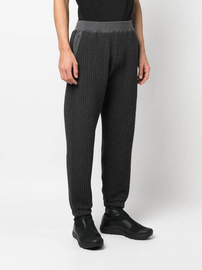 White Mountaineering Geribbelde trainingsbroek Grijs