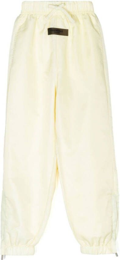 FEAR OF GOD ESSENTIALS Trainingsbroek met logopatch Beige
