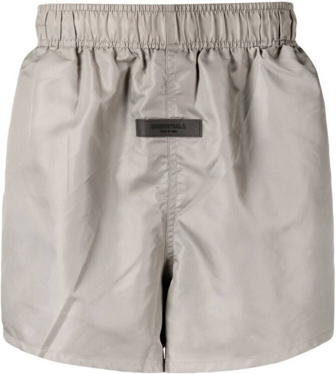 FEAR OF GOD ESSENTIALS Trainingsbroek met logo Beige