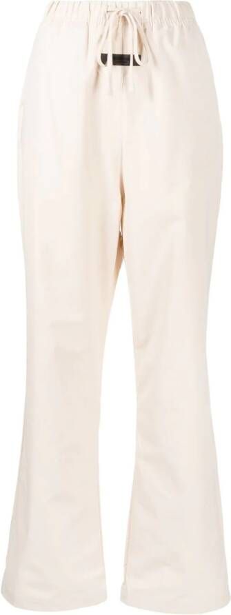 FEAR OF GOD ESSENTIALS Trainingsbroek met logostreep Beige