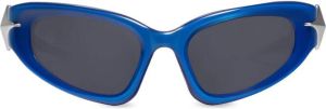 Gentle Monster Paso zonnebril met goggle-montuur Blauw