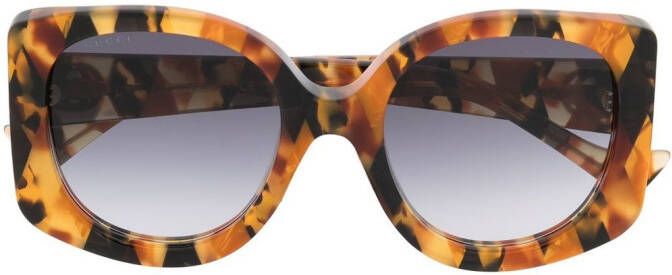 Gucci Eyewear Zonnebril met vlinder montuur Bruin