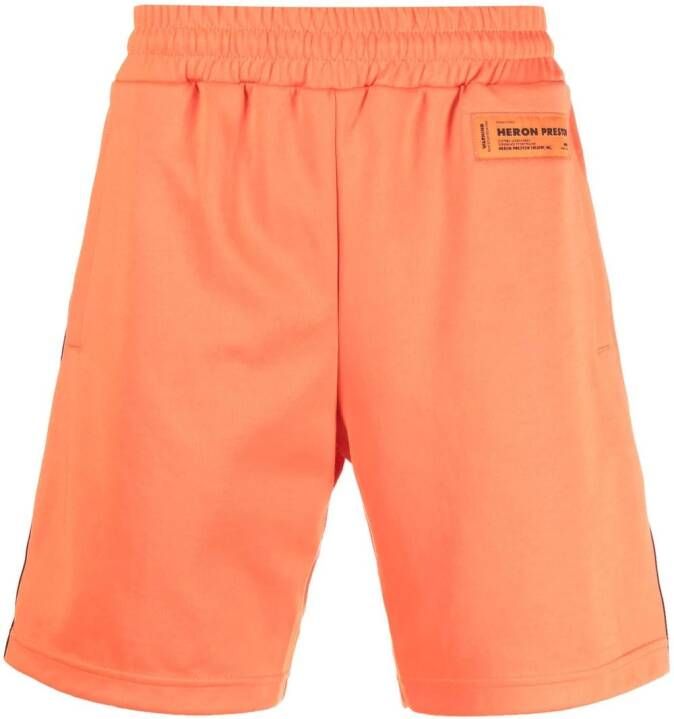 Heron Preston Trainingsshorts met logoband Oranje