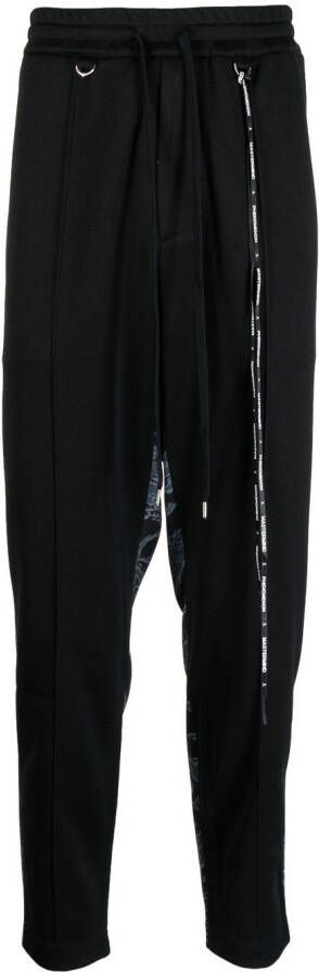 Mastermind World Trainingsbroek met camouflageprint Zwart