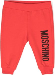 Moschino Kids logo-print stretch-cotton track pants Rood