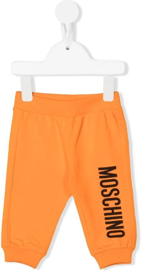 Moschino Kids Trainingsbroek met logoprint Oranje