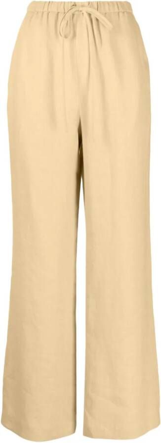 Nanushka Broek met trekkoordtaille Geel