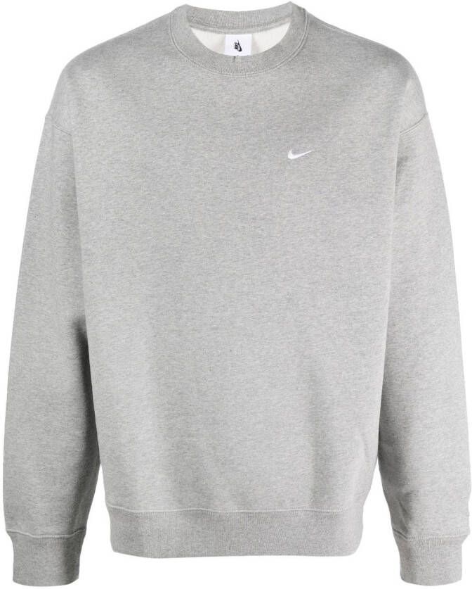 Nike Donsjack met geborduurd logo Beige