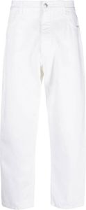 Studio Nicholson Jeans met toelopende pijpen Wit