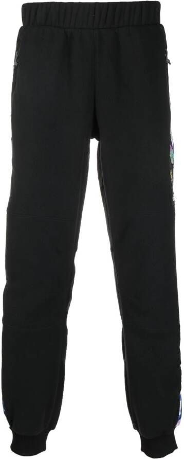 The North Face Trainingsbroek met vlakken en grafische print Zwart