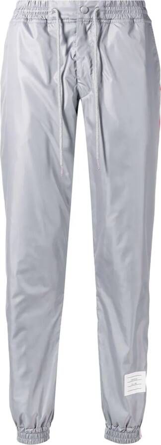 Thom Browne Trainingsbroek met strepen Grijs
