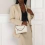 Stella Mccartney Crossbody bags Falabella Mini Crossbody Bag in crème - Thumbnail 1