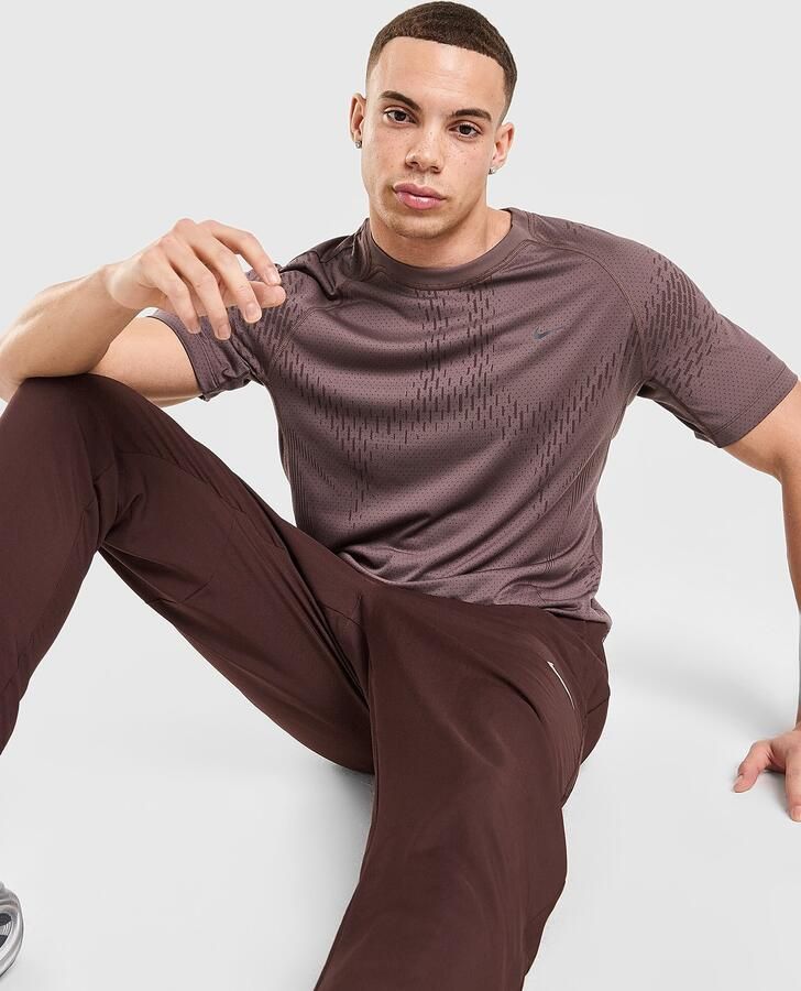 Nike Dri-FIT ADV hardlooptop met korte mouwen voor heren Stride Plus Paars- Heren Paars