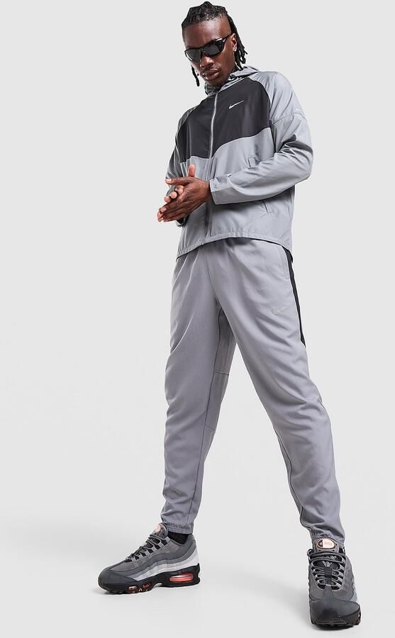 Nike Dri-FIT geweven hardloopbroek voor heren Challenger Grijs- Heren Grijs