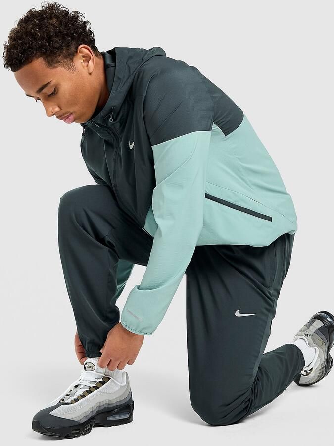 Nike Dri-FIT geweven hardloopbroek voor heren Challenger Groen- Heren Groen