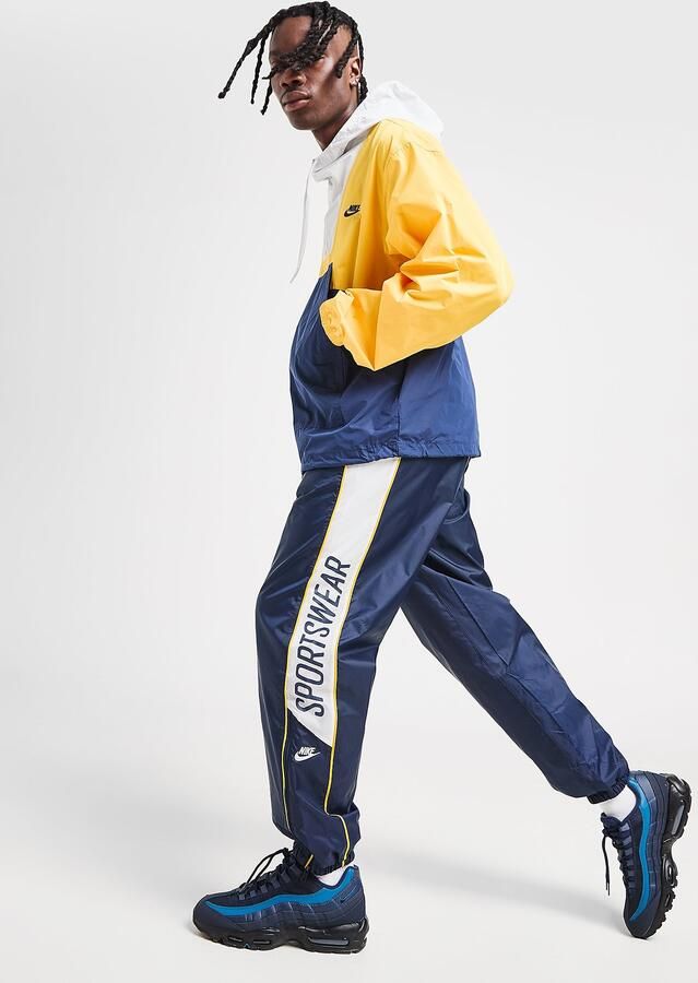 Nike Geweven joggingbroek voor heren Club Blauw- Heren Blauw