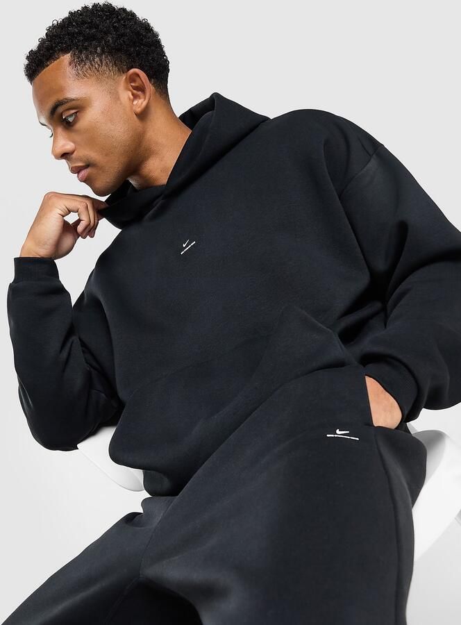 Nike Therma-FIT geborstelde basketbalhoodie voor heren Standard Issue Zwart- Heren Zwart