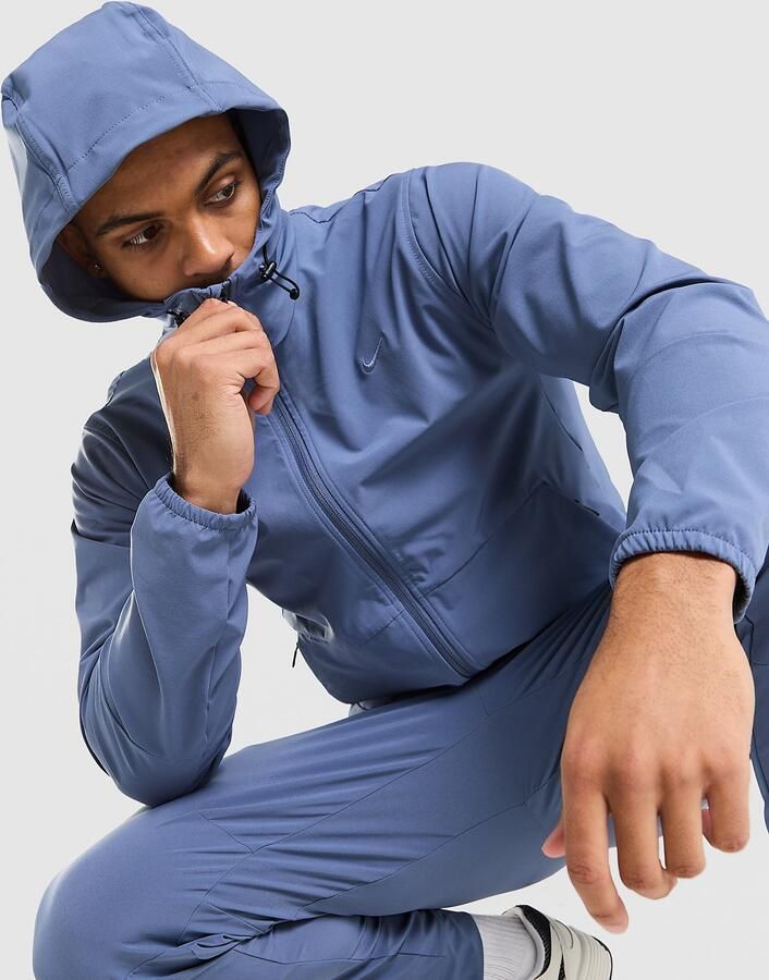 Nike veelzijdig Repel herenjack met capuchon Unlimited Blauw- Heren Blauw