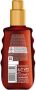 Garnier Ambre Solaire Ideal Bronze zonneolie SPF 15 150 ml Zonnebrand Wit - Thumbnail 4