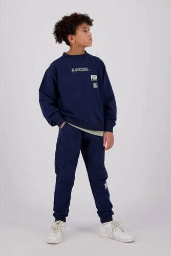 Raizzed tapered fit joggingbroek Tezu met logo donkerblauw Jongens Sweat 140