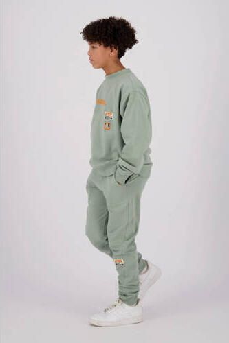 Raizzed tapered fit joggingbroek Tezu met logo zachtgroen Jongens Sweat 140
