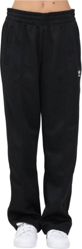 Adidas Originals Zwarte sportieve broek Eigentijdse twist Oversized pasvorm Zwart Dames