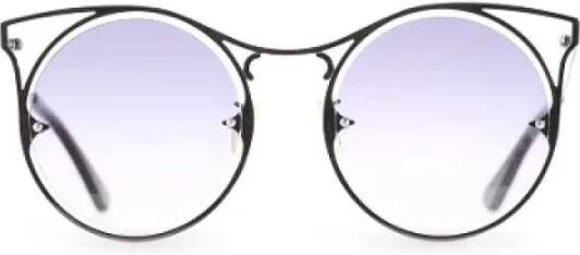 Alexander McQueen Pre-owned Metal sunglasses Grijs Dames