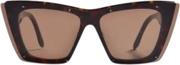 Alexander McQueen Pre-owned Metal sunglasses Zwart Dames