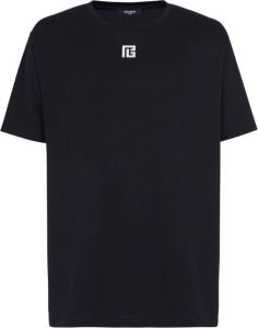 Balmain Oversized T-shirt van milieuvriendelijk katoen met reflecterende maxi logo print. Zwart Heren