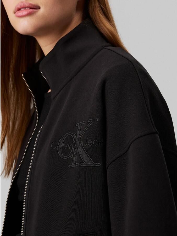 Calvin Klein Jeans Zwarte trui met satijnen logo applicatie Black Dames
