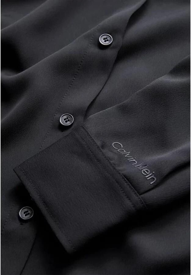 Calvin Klein Zwarte Overhemd met Relaxte Pasvorm Puntige Kraag en Lange Mouwen Black Dames