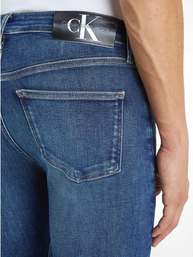 Calvin Klein Jeans Blauwe Effen Heren Jeans Rits Knoopsluiting Blue Heren