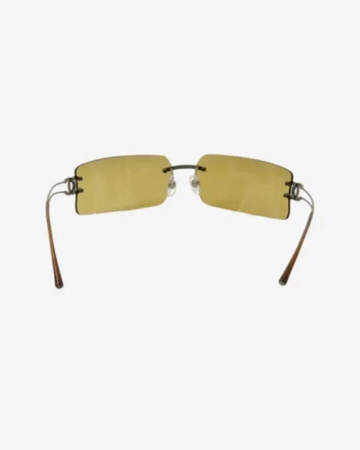 Chanel Vintage Pre-owned Metal sunglasses Yellow Dames