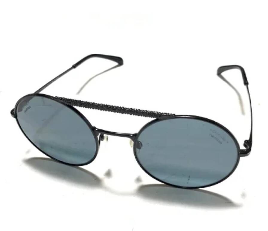 Chanel Vintage Pre-owned Metal sunglasses Zwart Dames