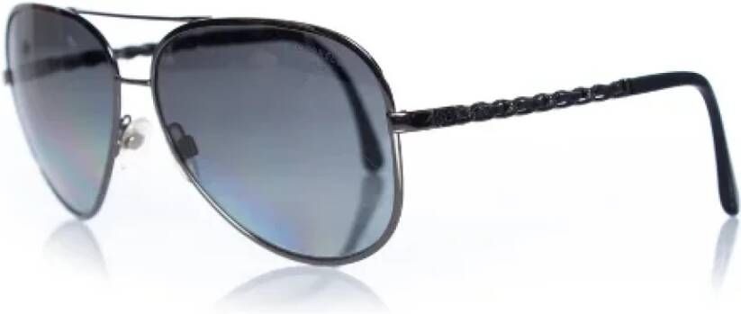 Chanel Vintage Pre-owned Metal sunglasses Zwart Heren