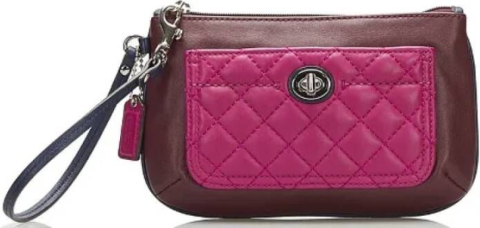 Coach Pre-owned Leather clutches Roze Dames